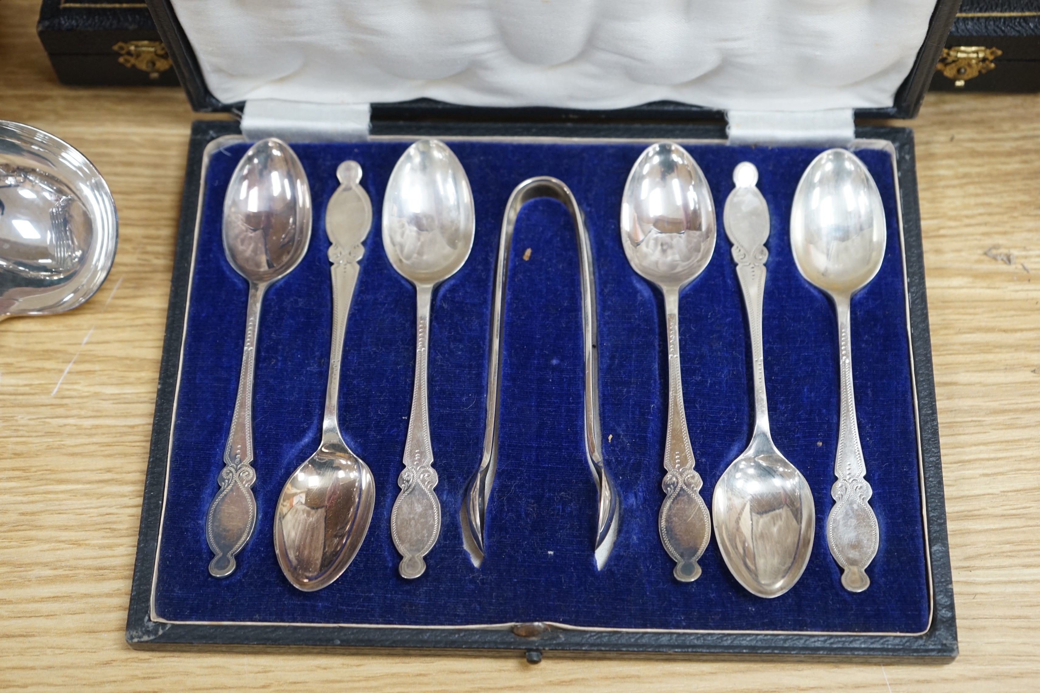 A quantity of silver plate including a cocktail shaker and a ewer